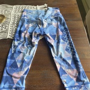 Cropped, breathable yoga Capri with fun print.